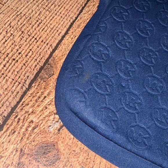 Michael Kors Mono Embossed Neoprene iPad Crossbody Purse Bag
Padded blue - Picture 14 of 16